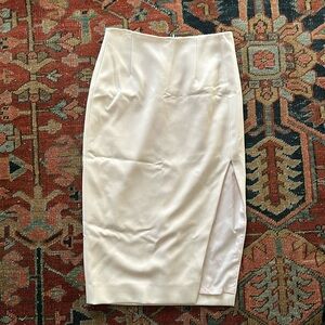 Pale pink pencil skirt with slit